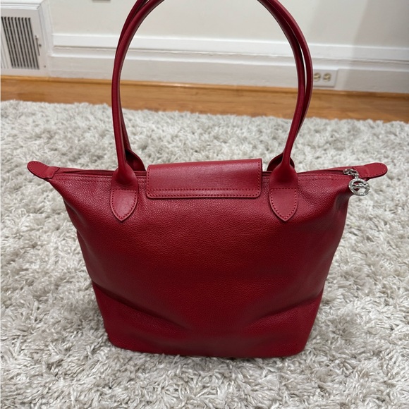 Longchamp Leather Cherry Red Tote Bag. Ling strap can wear over the shoulder. - Picture 2 of 7